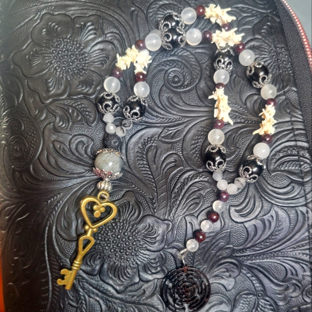 Hekate prayer beads. Made with real rattlesnake vertebrae,  genuine gemstones